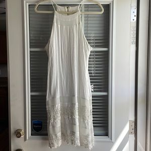 White Sleeveless Dress with Crochet Pattern